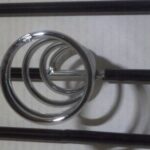 HAIRART-FLAT-IRON-SPIRAL-HOLDER-keeps-your-styling-tool-conveniently.jpg